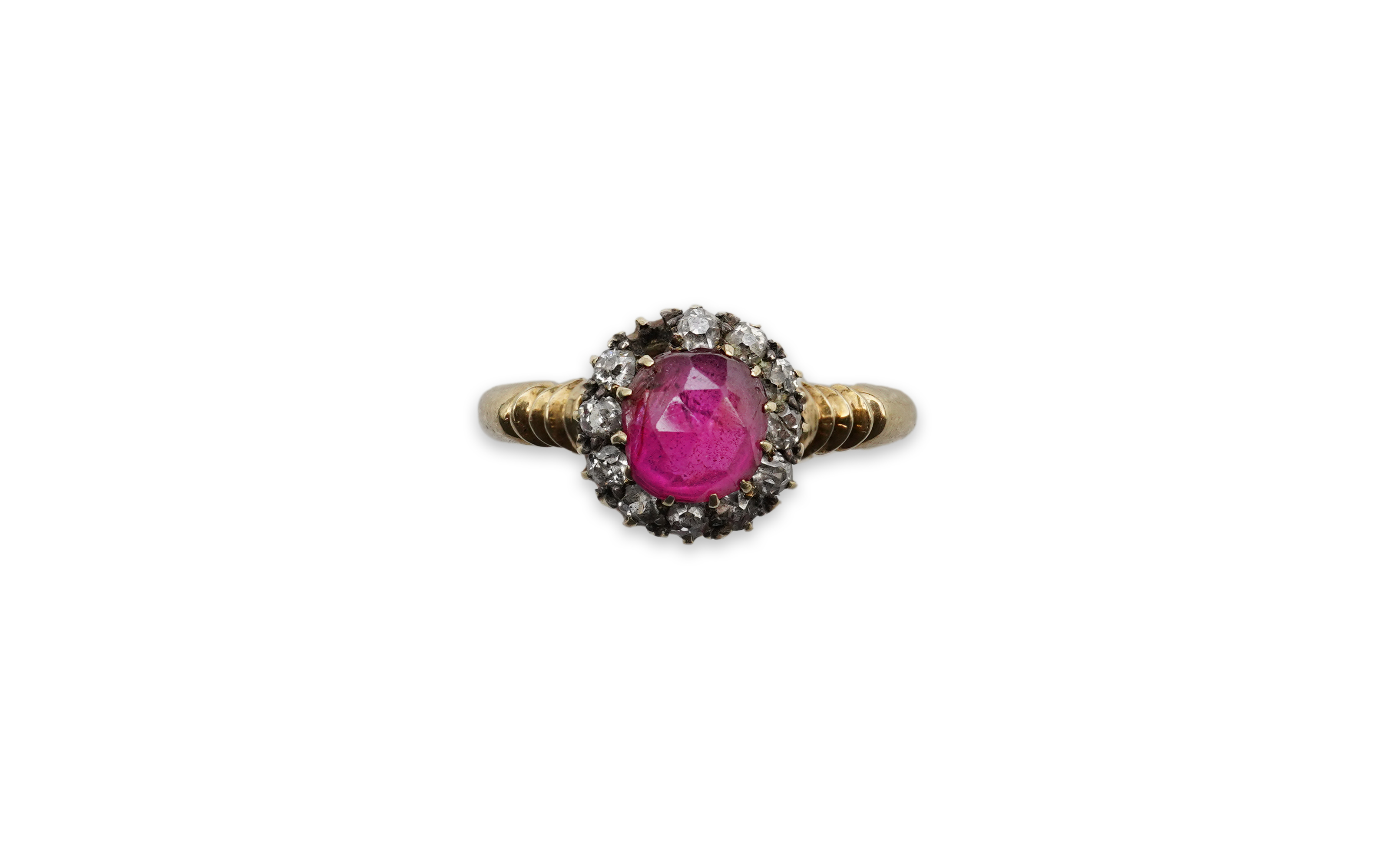 A ruby and diamond cluster ring, circa 1900